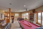 Eagle Trail Lodge game room with pool table and foosball.
